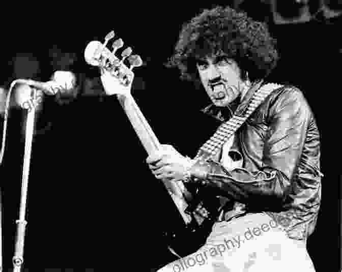A Black And White Portrait Of Philip Lynott, The Legendary Frontman Of Thin Lizzy, With A Guitar In His Hand My Boy: The Philip Lynott Story