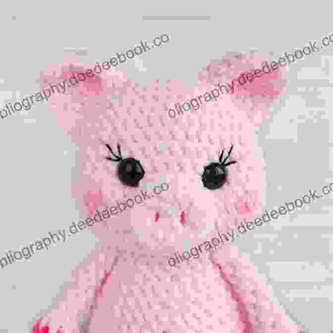 A Cheerful Crocheted Pig Made With Chunky Yarn, Showcasing A Playful Expression, Curly Tail, And Rosy Cheeks. Mabel Bunny Co : 15 Loveable Animals To Crochet Using Chunky Yarn