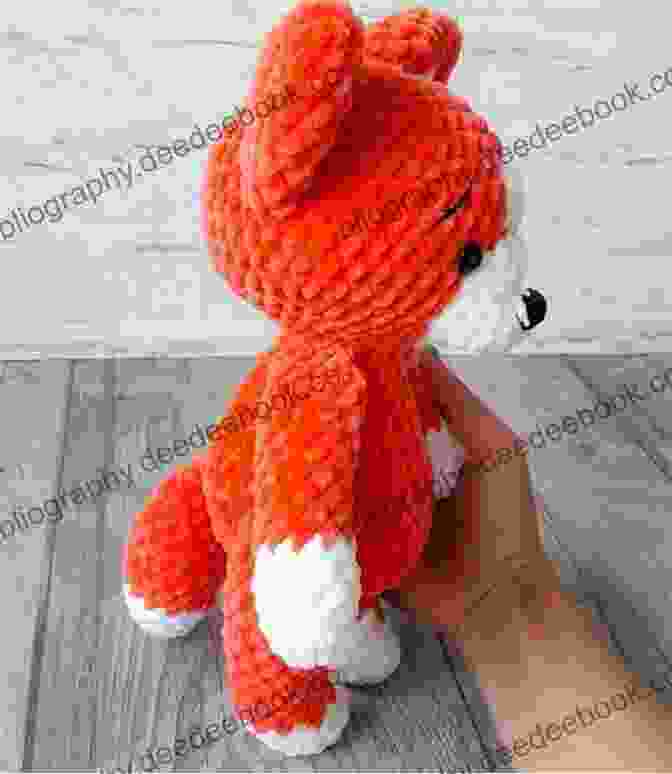 A Cunning Crocheted Fox Made With Chunky Yarn, Featuring A Sly Expression, Bushy Tail, And Curious Gaze. Mabel Bunny Co : 15 Loveable Animals To Crochet Using Chunky Yarn