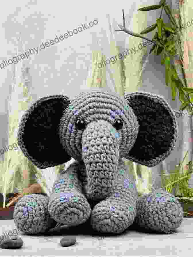 A Majestic Crocheted Elephant Made With Chunky Yarn, Featuring Large Ears, A Long Trunk, And A Sweet, Gentle Appearance. Mabel Bunny Co : 15 Loveable Animals To Crochet Using Chunky Yarn