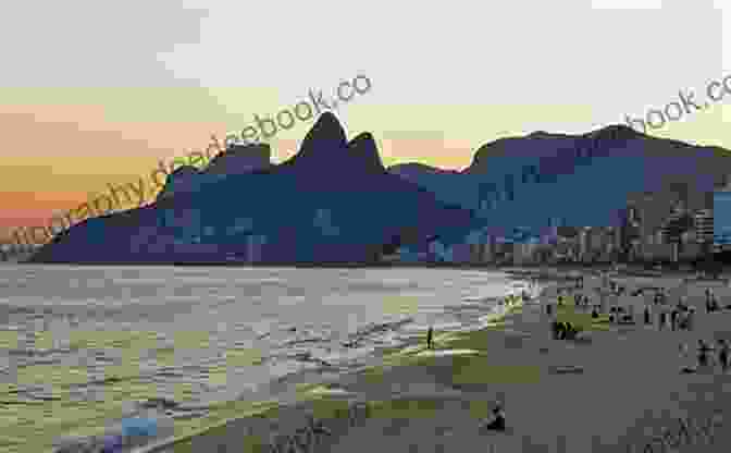 A Peaceful Image Of Ipanema Beach, Showcasing The Calm Waters, Soft Sands, And Lush Greenery Lining The Shore. Savoring Joga Bonito: The World Cup 2024 Bucket List For Fans In Rio