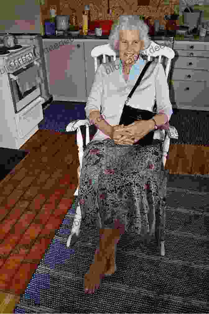 Miss Julia, An Elderly Woman With White Hair And A Mischievous Smile, Sits In Her Rocking Chair With A Book In Hand. Miss Julia Speaks Her Mind: A Novel